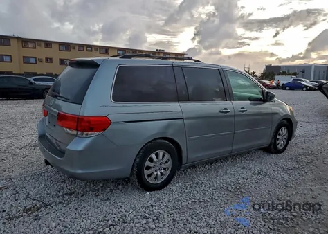 2010 Honda Odyssey Exl z USA, uszkodzony, nr VIN 5FNRL3H73AB025432